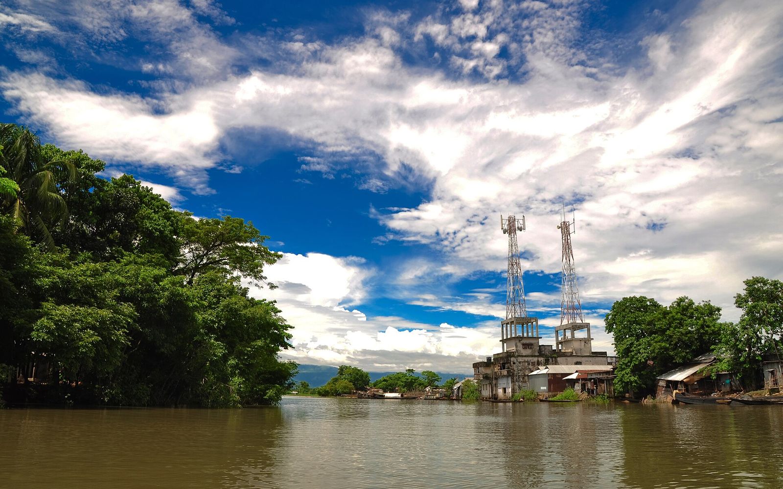 Grameenphone Nextern: What Grameenphone Has Published, What It Hasn't, and How to Be Ready for the Next Call 1 The CV Guy is the No.1 Resume/CV Writer in Bangladesh, Asia & Middle East Two mobile network towers on a riverside building in the haor region of Bangladesh under a blue sky