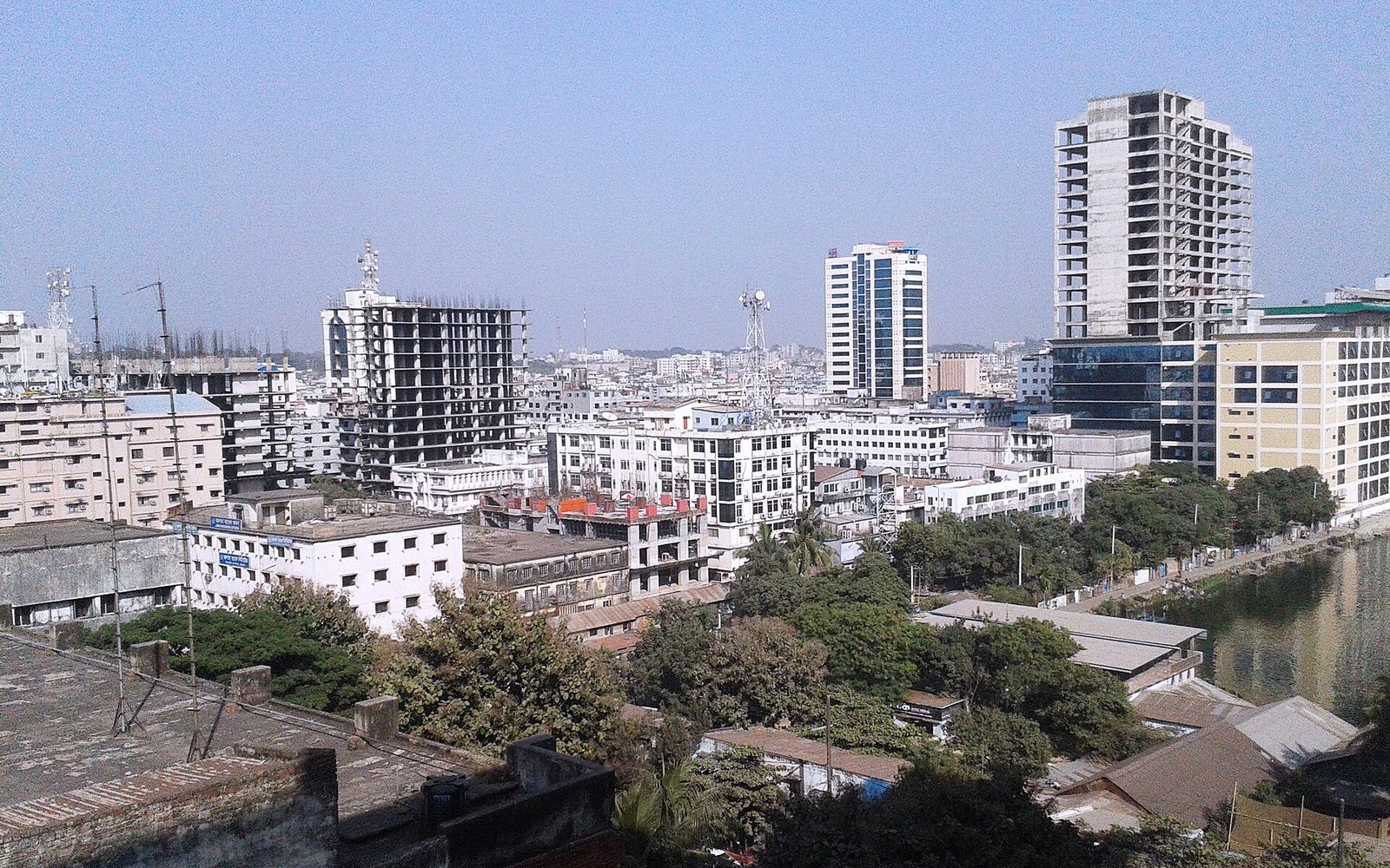 Rooftop view of office buildings, mobile network towers and trees in the Agrabad commercial area of Chattogram
