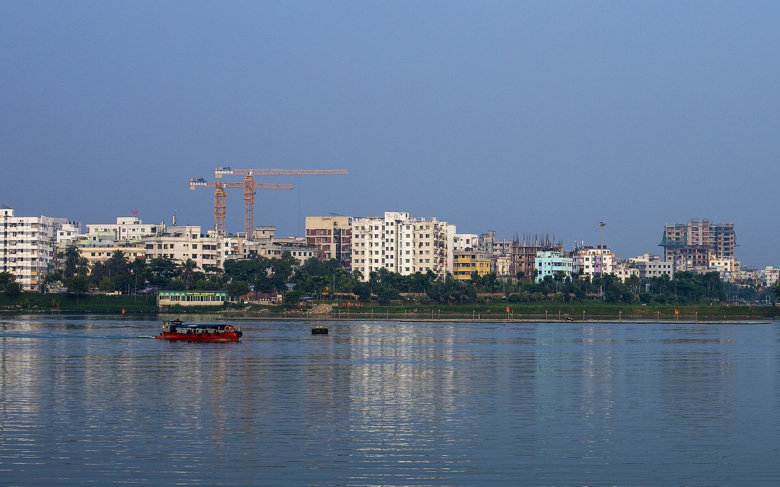 Unilever Future Leaders Programme (UFLP) in Bangladesh: What Unilever Has Published, What It Hasn't, and How the 2026 Intake Ran 1 The CV Guy is the No.1 Resume/CV Writer in Bangladesh, Asia & Middle East Hatirjheel lake in Dhaka with a red water taxi in the foreground and apartment blocks and construction cranes on the far bank